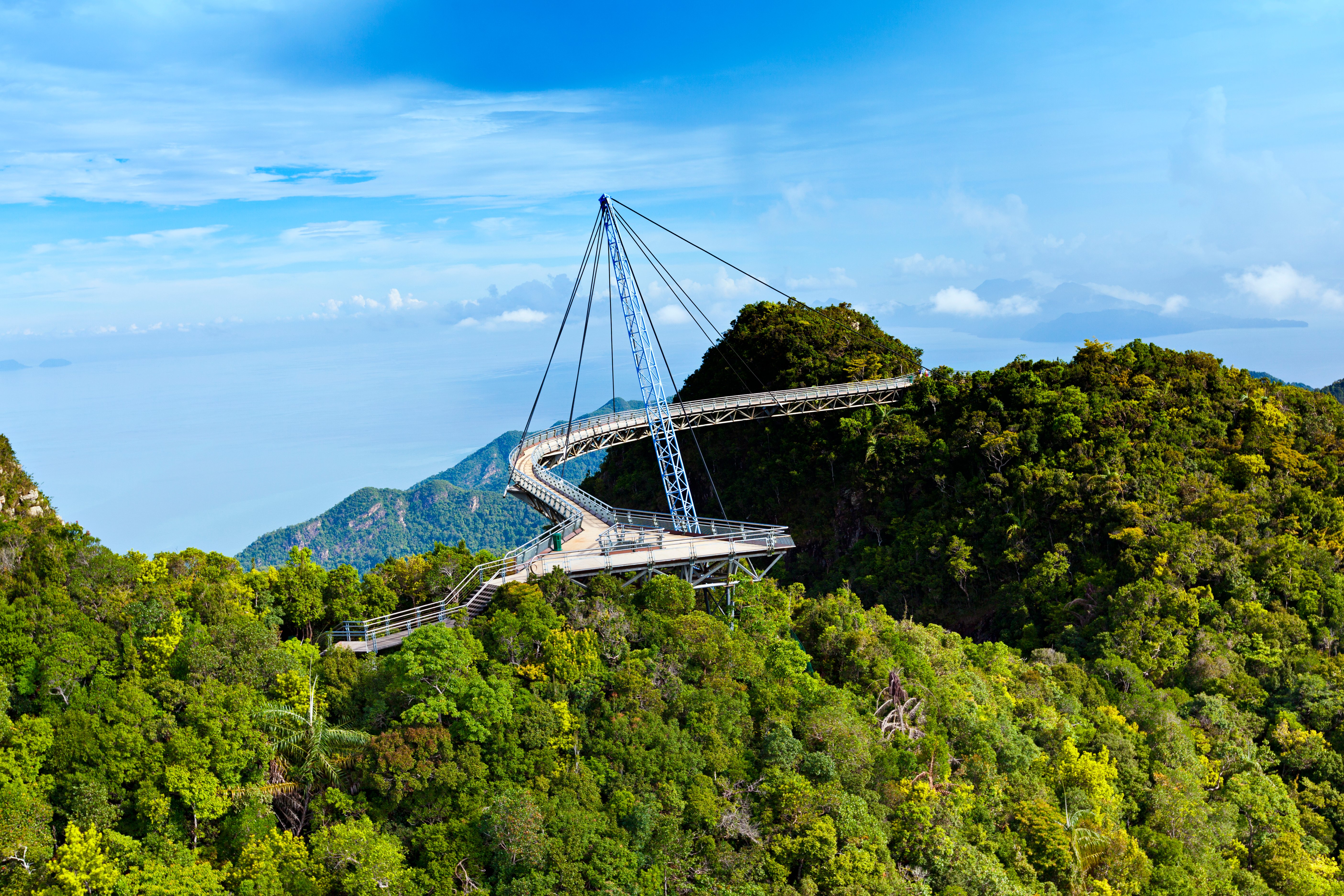 Amazing cable bridge over the tropical rainforest island landscape.